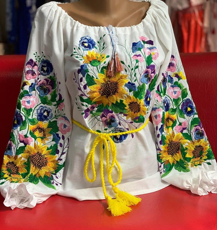 Women's embroidered blouse with a floral embroidery design