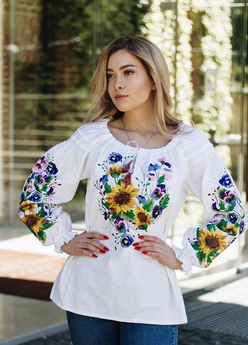 Women's embroidered blouse with a floral embroidery design