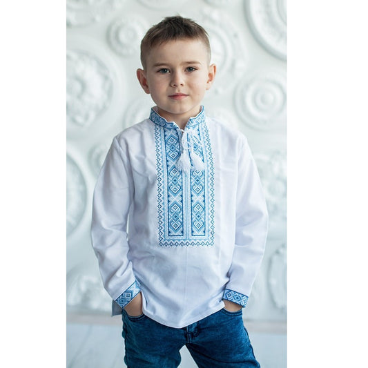 Embroidered shirt with a blue pattern for a boy.