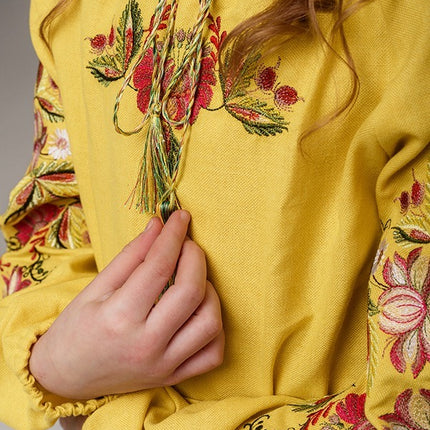 Girl's yellow embroidered dress