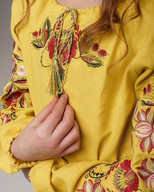 Girl's yellow embroidered dress