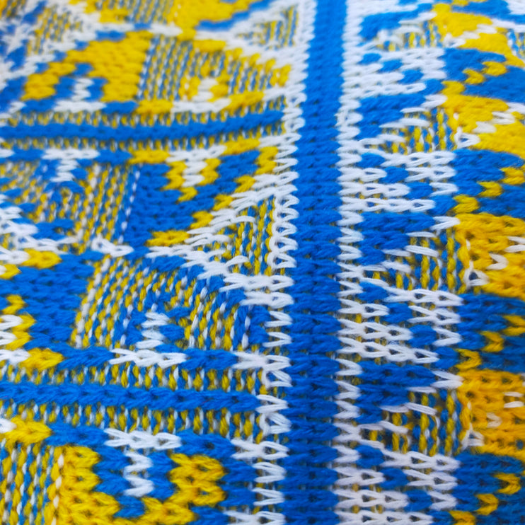 Knitted women's vyshyvanka with a yellow-blue ornament