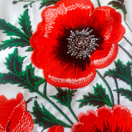 Female embroidered blouse with poppies