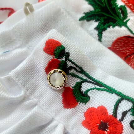 Female embroidered blouse with poppies