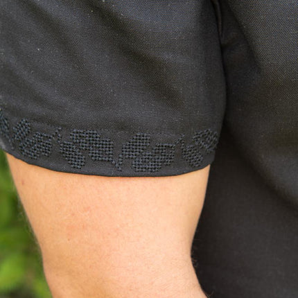 Stylish men's single-color embroidered shirt with the emblem of Ukraine