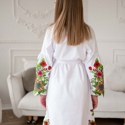 White girl's embroidered dress with sunflowers