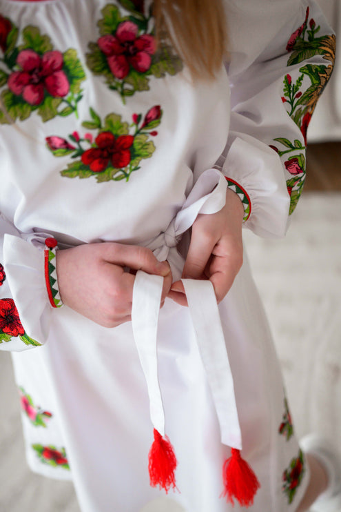 White girl's embroidered dress with sunflowers