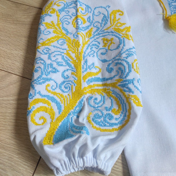 Women's embroidered blouse with yellow and blue embroidery