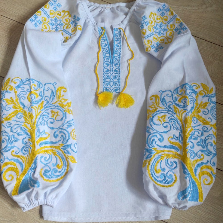 Women's embroidered blouse with yellow and blue embroidery