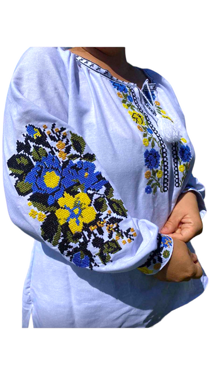 Women's embroidered blouse with blue and yellow embroidery