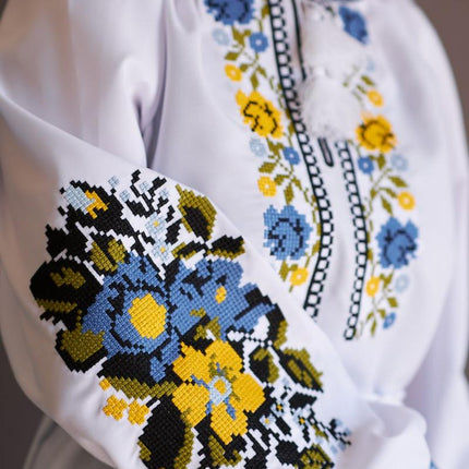 Women's embroidered blouse with blue and yellow embroidery