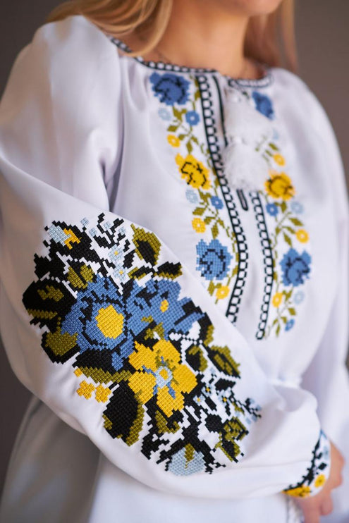 Women's embroidered blouse with blue and yellow embroidery