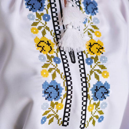 Women's embroidered blouse with blue and yellow embroidery