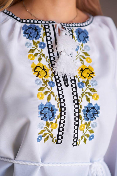 Women's embroidered blouse with blue and yellow embroidery