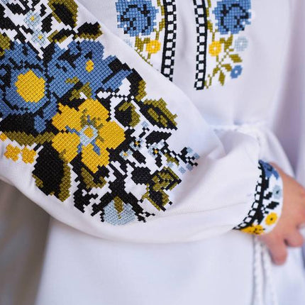 Women's embroidered blouse with blue and yellow embroidery