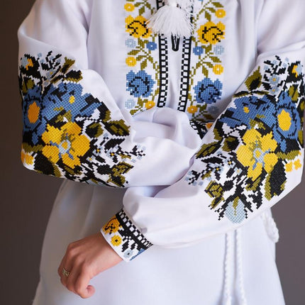 Women's embroidered blouse with blue and yellow embroidery