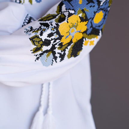 Women's embroidered blouse with blue and yellow embroidery