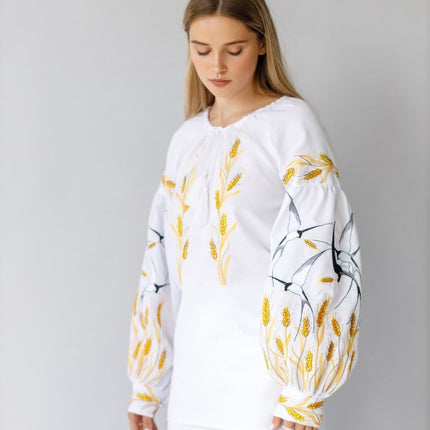 Women's embroidered blouse with swallows and ears of wheat