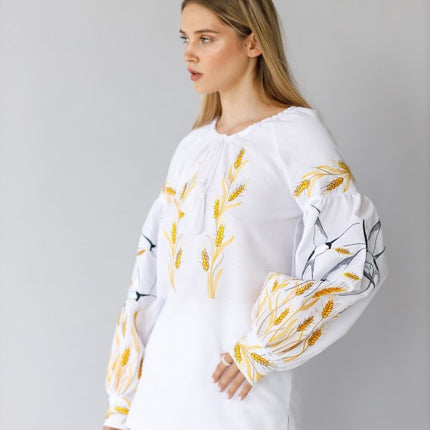 Women's embroidered blouse with swallows and ears of wheat