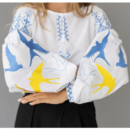 Women's embroidered blouse with swallows in Ukrainian style