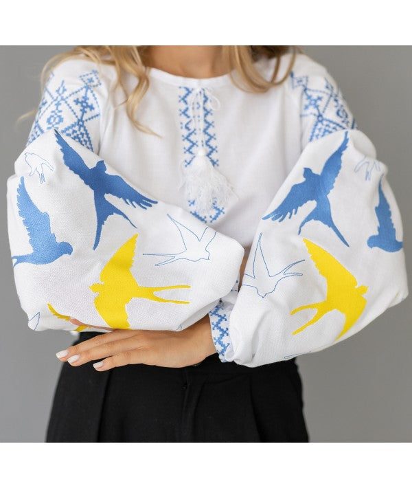 Women's embroidered blouse with swallows in Ukrainian style