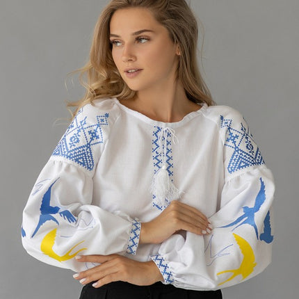 Women's embroidered blouse with swallows in Ukrainian style