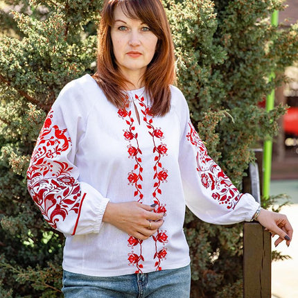 Women's embroidered shirt with a blooming ornament