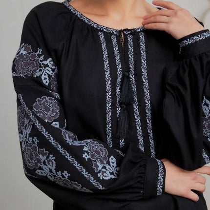 Embroidered women's blouse with a floral pattern