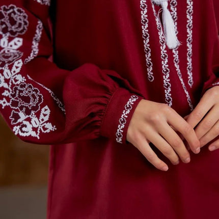 Embroidered women's blouse with a floral pattern