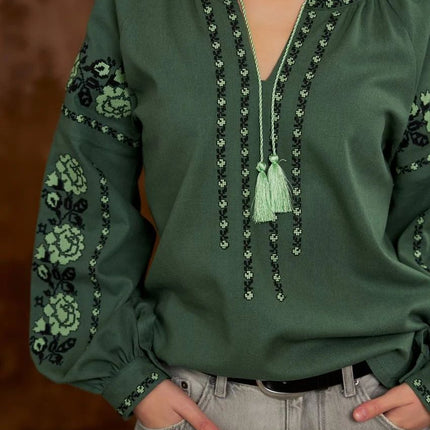 Embroidered women's blouse with a floral pattern