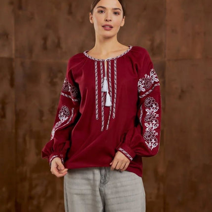 Embroidered women's blouse with a floral pattern