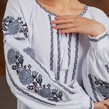 Embroidered women's blouse with a floral pattern